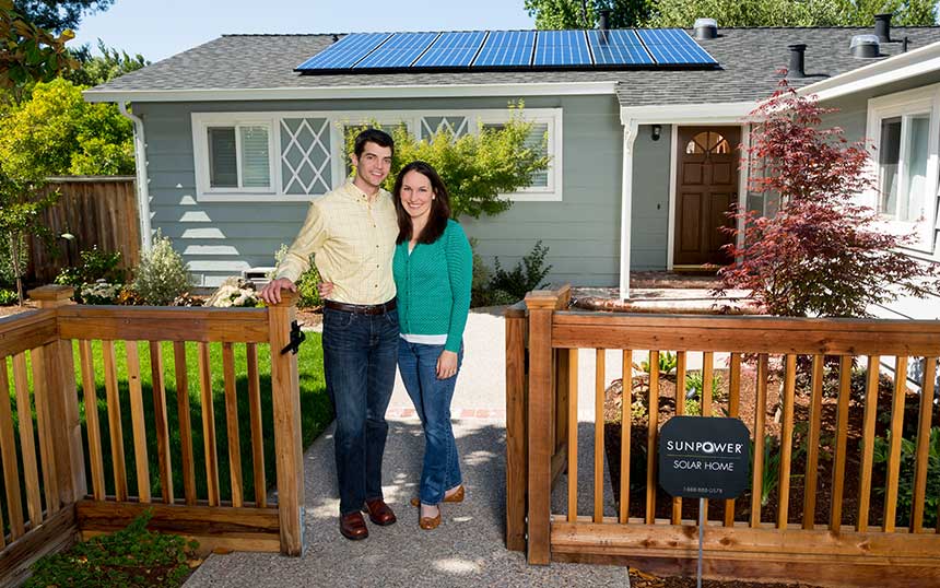Happy Couple With SunPower Solar Panels